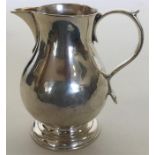 An early Georgian pitcher cream jug. London 1729.