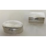 Two modern silver hinged top pill boxes. Approx. 1