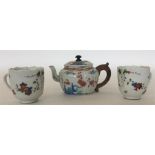 A small Chinese porcelain lobed oval teapot and co