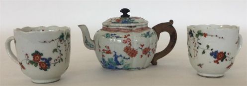 A small Chinese porcelain lobed oval teapot and co