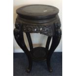 A circular Chinese pedestal jardiniere stand on ta