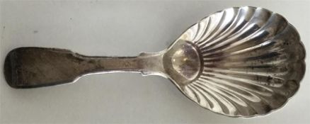 A Georgian silver fiddle pattern caddy scoop. Lond