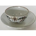 An 18th Century porcelain tea bowl finely painted
