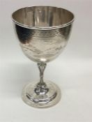 A Victorian silver goblet engraved with rural land