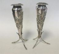 A pair of Chinese silver spill vases of tapering f