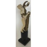 A good quality ivory and brass mounted statue of a