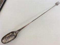 An unusual Continental silver pickle fork / pierce