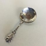 A Georgian silver bright cut caddy spoon attractiv