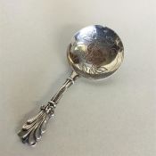 A Georgian silver bright cut caddy spoon attractiv