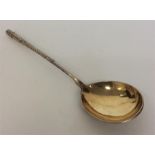 A good quality Russian silver gilt spoon decorated