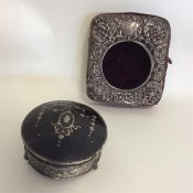 A silver mounted Goliath watch case together with