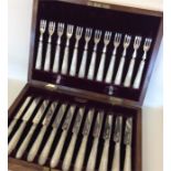 A good boxed set of 12 + 12 silver bladed cake kni