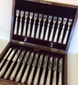 A good boxed set of 12 + 12 silver bladed cake kni