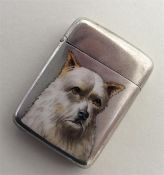 A novelty silver and enamel vesta case depicting a