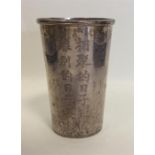 A heavy silver Chinese tapering beaker. Marked to