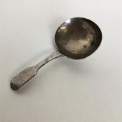 A Georgian silver caddy spoon. London. By CB. Appr