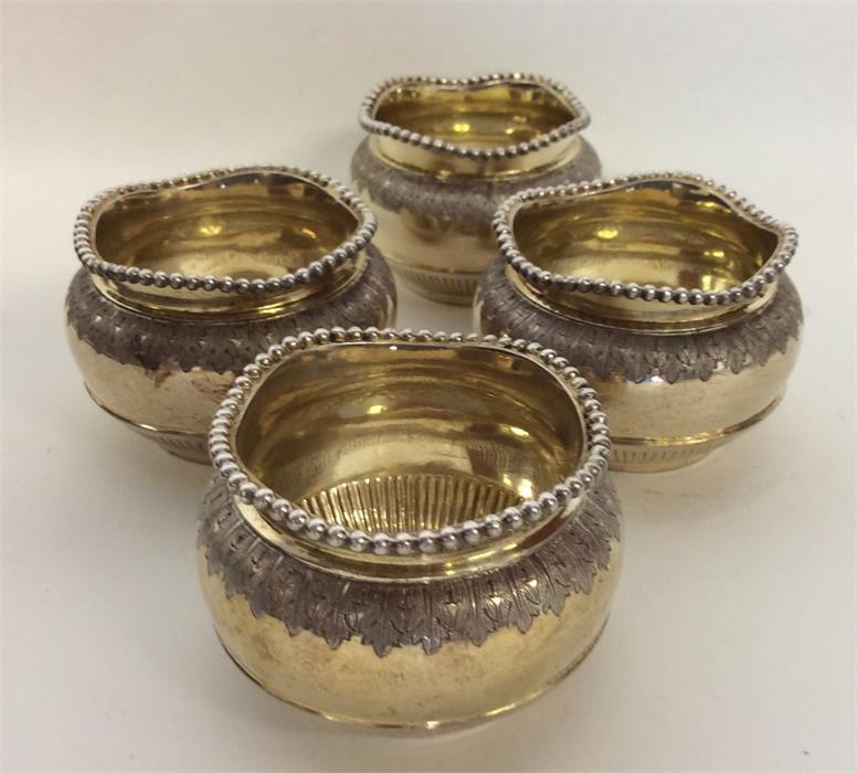 A good set of four silver gilt salts with beaded r - Image 2 of 2