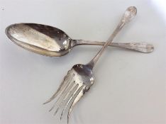 A pair of Continental silver servers. Approx. 201