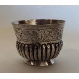 A small Russian silver tot with fluted body. Appro