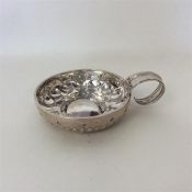 An Antique Continental silver wine taster of flute