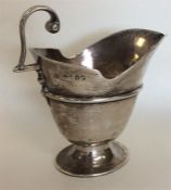 A good Georgian-style silver sauce boat on pedesta