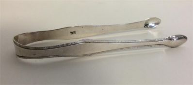 HESTER BATEMAN: A pair of Georgian sugar tongs wit