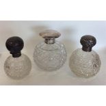 A group of three silver topped hobnail cut scent b