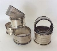 A group of six silver napkin rings. Various dates