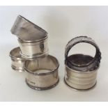 A group of six silver napkin rings. Various dates