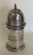 A good in-date Victorian silver caster with fluted