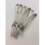 A heavy set of six silver fiddle pattern dessert f