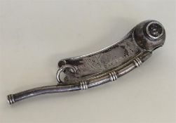 A rare silver whistle attractively decorated with