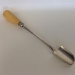 A good Victorian silver stilton scoop with turned