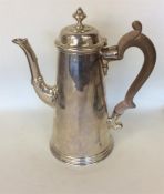 A Georgian silver tapering coffee pot with hinged
