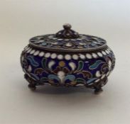 A Russian silver and enamel pot and cover on ball