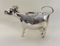 An unusual silver cow creamer of typical design. A