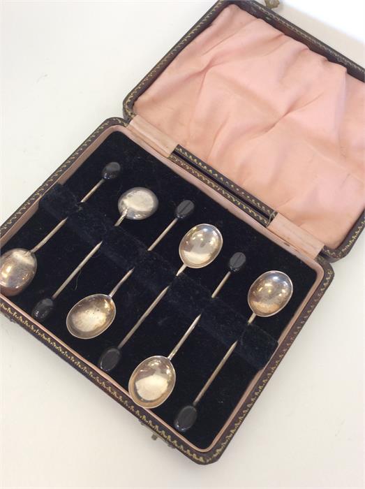 A boxed set of six bean top coffee spoons. Sheffie