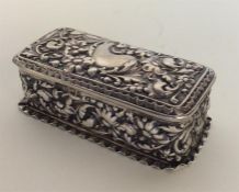 A heavy silver rectangular embossed box with crimp
