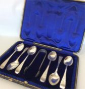 A boxed set of 6 large bright cut silver teaspoons