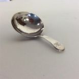 A Georgian silver OE caddy spoon. London. By IB. A