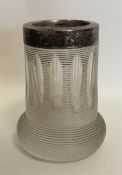 A small etched glass and silver mounted vase. Birm