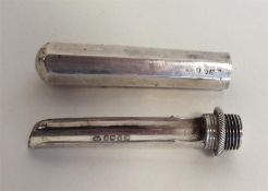 A Georgian silver travelling apple corer with pane