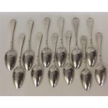 A good set of twelve Georgian picture back spoons