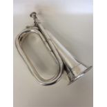 An unusual silver full-size plain bugle without en