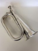 An unusual silver full-size plain bugle without en