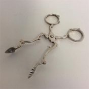 A pair of good Georgian sugar scissors with silver