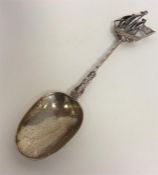 A Continental silver spoon, the terminal mounted w