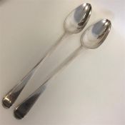 A pair of heavy OE and thread silver basting spoon