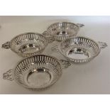 A set of four Edwardian sweet dishes with pierced