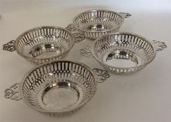 A set of four Edwardian sweet dishes with pierced